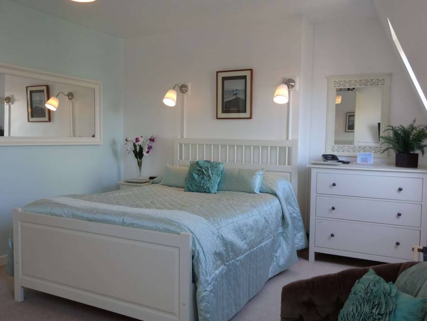 Spacious Master Bedroom with LED TV with Freeview & DAB Radio and picturesque views of the Old Town  and church spires.